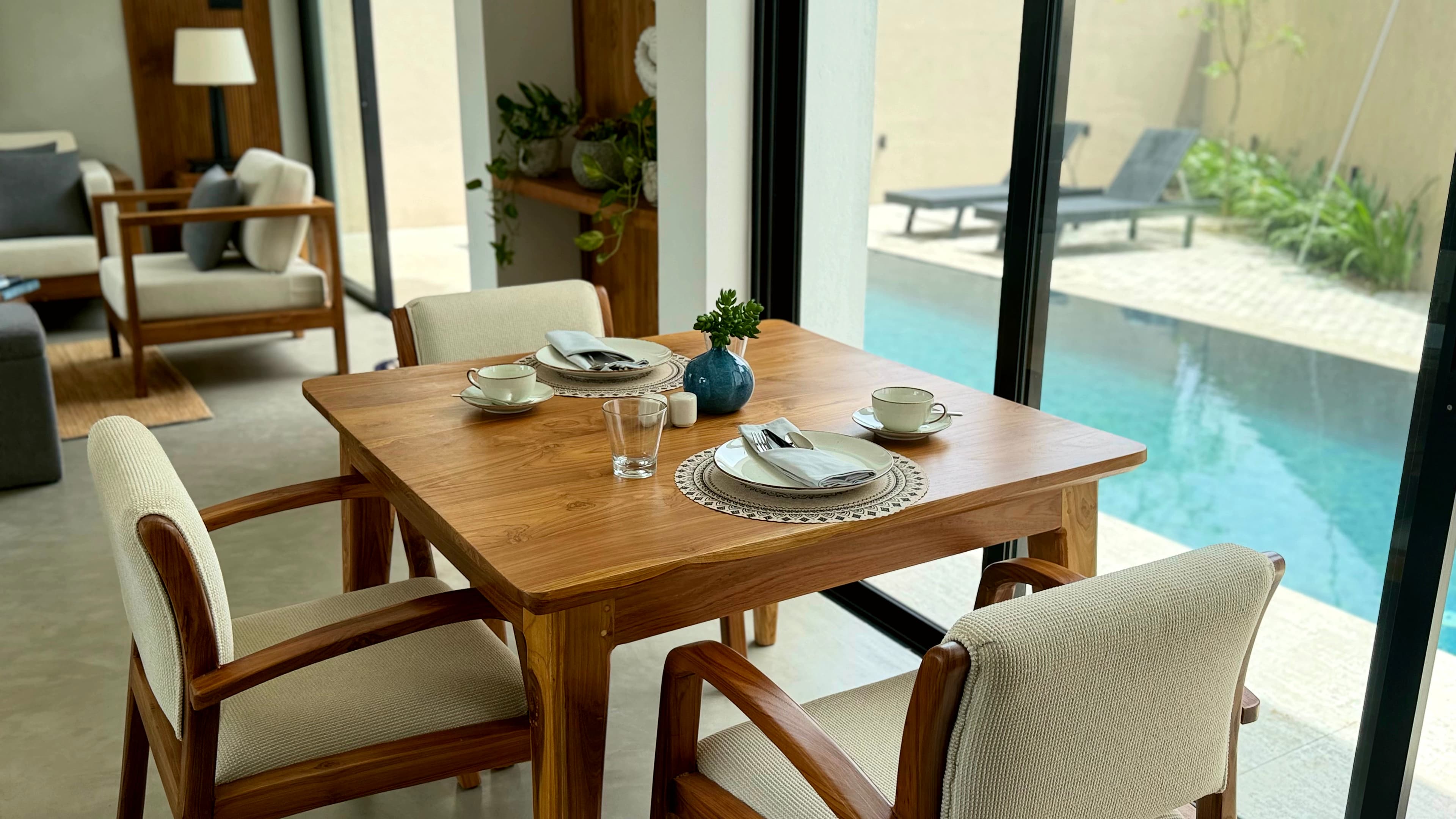 Dining area overlooking the pool courtyard at Ayu by TARA