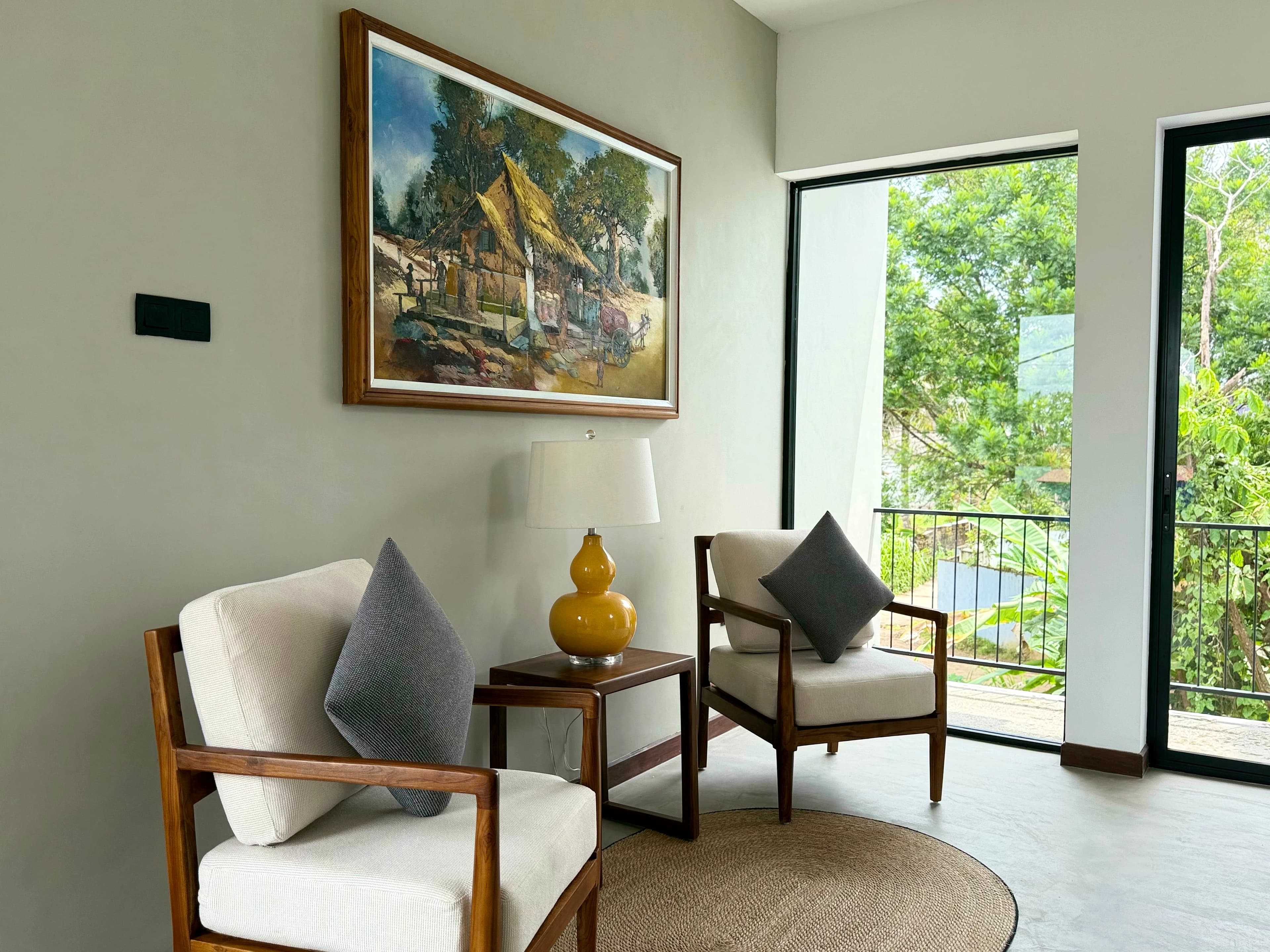Second-floor terrace at Ayu by TARA, built-in seating and greenery