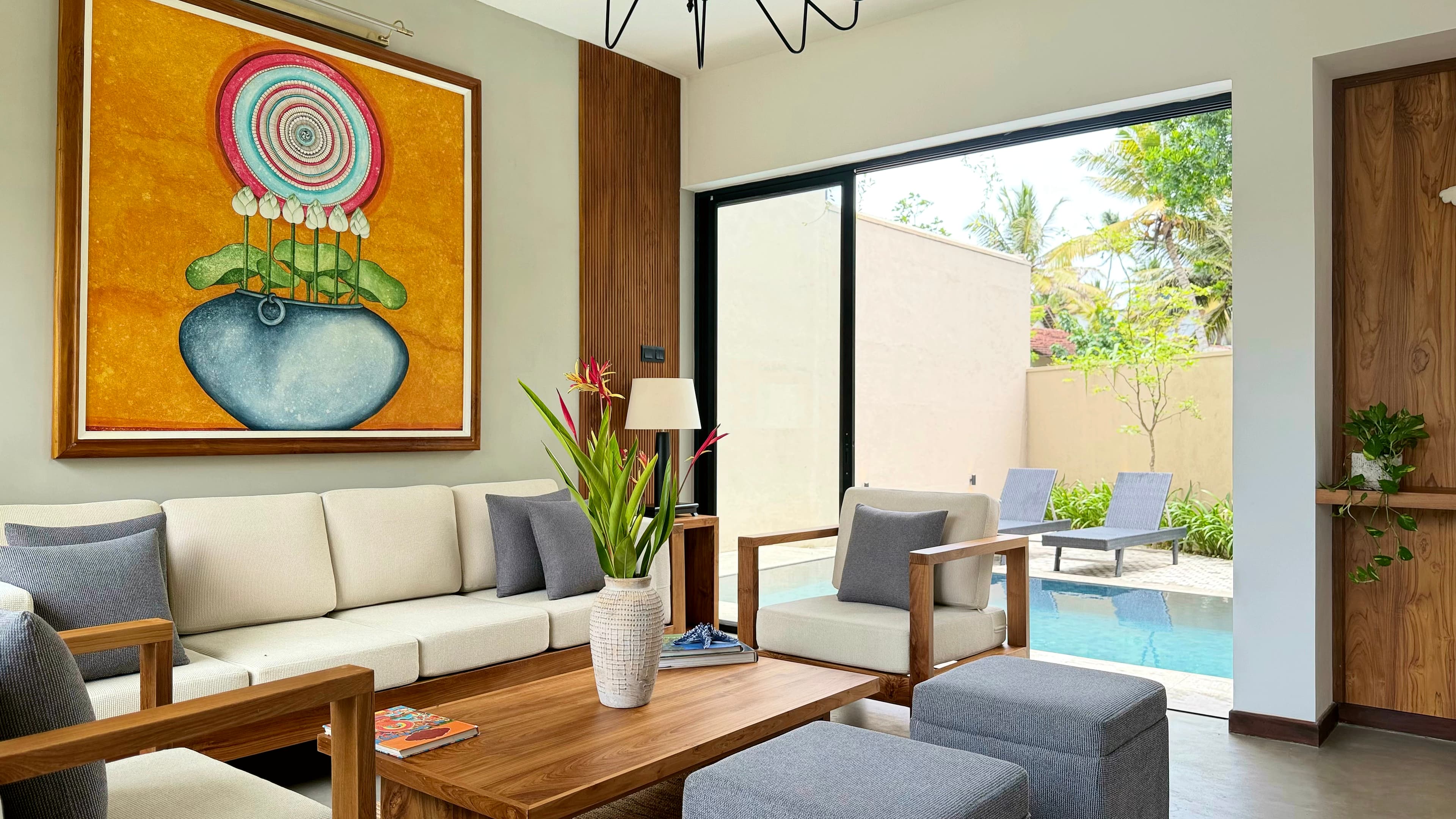 Lounge at Ayu by TARA opening onto the swimming pool courtyard